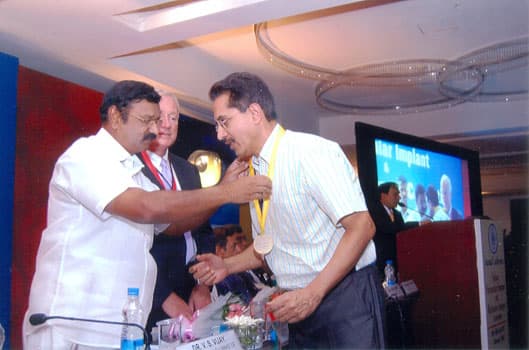 Dr. Lakhotia receiving Gold Medal from international Conference.jpg